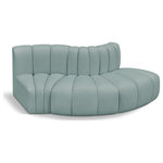 Meridian Furniture - Arc Vegan Leather Upholstered 3-Pc. S-Shaped Modular Sofa, Green - Unleash modern opulence with the Arc Vegan Leather 3pc. Sectional. Crafted for the modern connoisseur, this Sectional injects an air of refined luxury into any space. Its sleek silhouette, upholstered in supple mint green vegan leather, exudes timeless sophistication while the deep channel tufting adds textural intrigue, further elevating the chair's visual appeal. The modular design makes it a versatile chameleon, effortlessly adapting to your evolving needs and preferences. Whether you envision it gracing a chic living room corner, basking in the glow of a bedroom window, or adding a touch of drama to a home office, the Arc seamlessly complements your unique interior aesthetic.