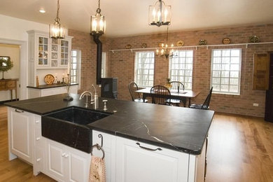 Example of a classic kitchen design in Other