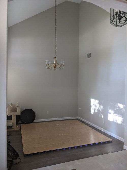 Turning 11'x11' high ceiling formal dining room into library?