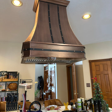 Bespoke Copper Range Hood Featuring Custom Rivet Bands