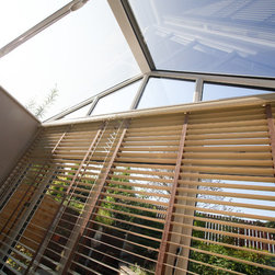 White Conservatory with PVCu Bi-Fold Doors - Products