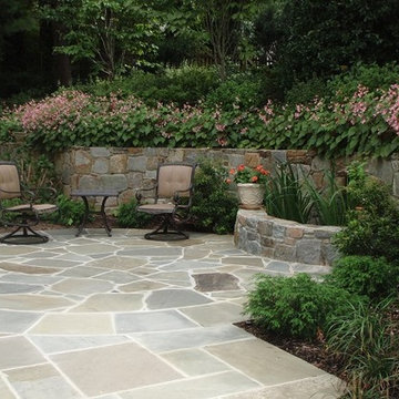 Stone Patio with Retaining Wall and Water Feature