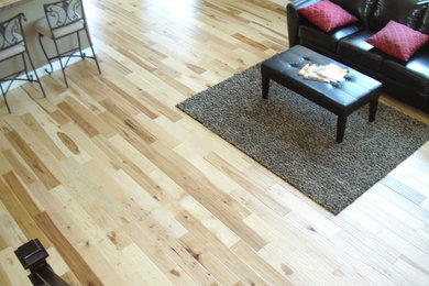 Inspiration for a large contemporary formal and enclosed light wood floor living room remodel in Other with beige walls, no fireplace and no tv