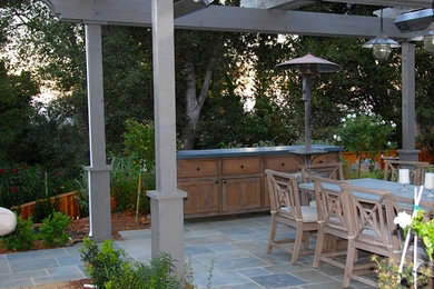 Elegant patio photo in Other