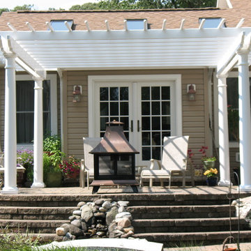 Backyard Patio with Pergola, Landscaping and Pond