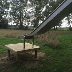 Big stainless steel Slide from a Tree-deck down to a small platform - Products