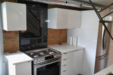 Example of a minimalist kitchen design in Toronto