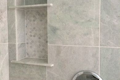 This is an example of a beach style bathroom in Boston with an open shower.