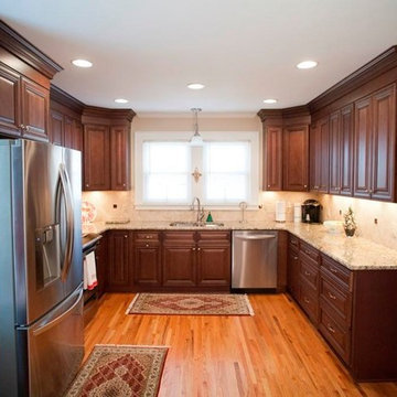 Venetian Ice Granite On Dark Wood Cabinets