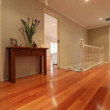 Upstairs Hallway with a Soft but Stunning Quick Step Floating ReadyFlor in Blue