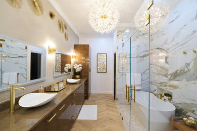 Example of a large trendy master double-sink bathroom design in Tampa with flat-panel cabinets, brown cabinets and a built-in vanity