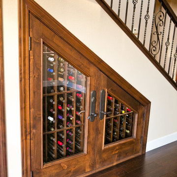 Under the stairway wine cellar