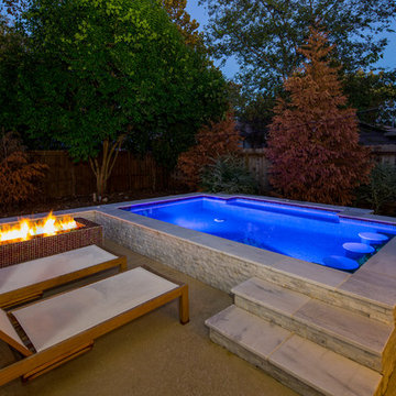 Large Downtown Modern Spa with Glass Tile Fire Feature