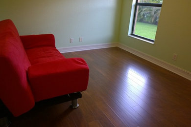 Inspiration for a timeless laminate floor bedroom remodel in Other