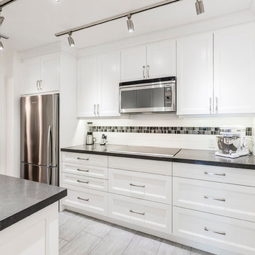 Condo White Galley Kitchen