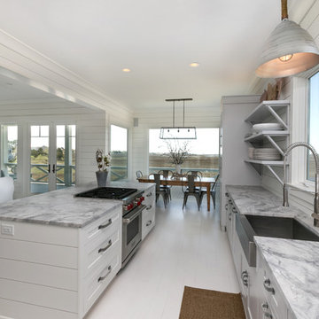 White Kitchen in Beach Home - White Walls - Kitchen With Open Shelving