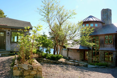 Example of a mountain style two-story mixed siding house exterior design in Boston