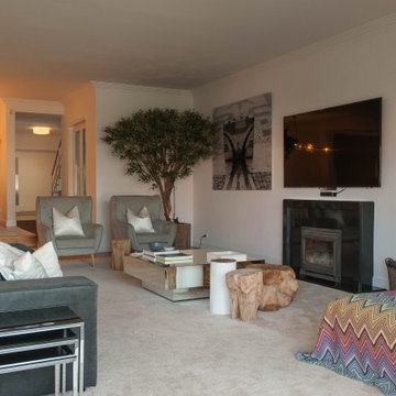 Birre living room with sofa, olive tree and dining view