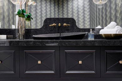 Bathroom - transitional single-sink bathroom idea in Phoenix with black cabinets, a built-in vanity and furniture-like cabinets
