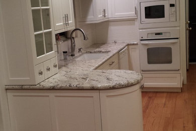 Refacing with white shaker doors