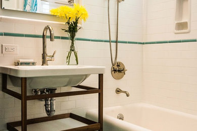 Eclectic multicolored tile and ceramic tile ceramic tile bathroom photo in San Francisco with a console sink, medium tone wood cabinets, a two-piece toilet and blue walls