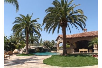 Example of a tuscan home design design in San Diego