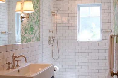 Bathroom - traditional white tile and porcelain tile ceramic tile and white floor bathroom idea in San Francisco with open cabinets, black cabinets, a two-piece toilet, green walls, a console sink and solid surface countertops
