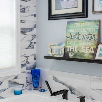 Bathroom remodeling in Columbia, MD with double vanity & marble bathtub