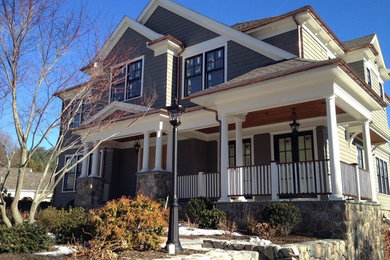 Example of a classic gray two-story vinyl exterior home design in Boston