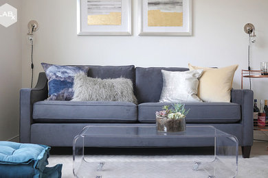 Living room - small modern light wood floor living room idea in San Francisco with white walls