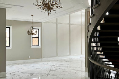 Dining room - transitional porcelain tile and wall paneling dining room idea in Ottawa