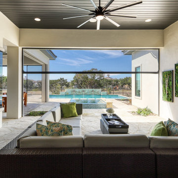 Chic Contemporary Pool with Negative Edge Spa