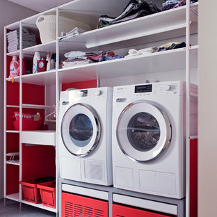 Photo of a medium sized contemporary single-wall separated utility room in Frankfurt with open cabinets, white cabinets, grey walls, terracotta flooring and grey floors.