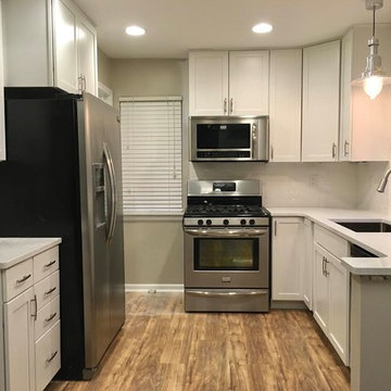 Kitchen Cabinets Refinished from Maple to White