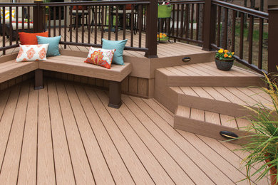 This is an example of a mid-sized beach style backyard deck in Salt Lake City with no cover.
