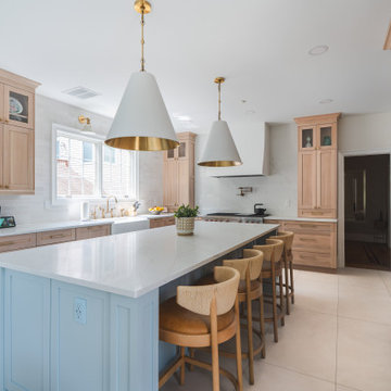 Scandinavian Kitchen with Light Oak Cabinets and Quartzite Island