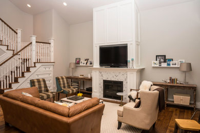 Mid-sized transitional open concept dark wood floor family room photo in Other with white walls, a standard fireplace, a tile fireplace and a tv stand