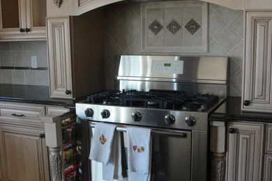 Open concept kitchen - mid-sized l-shaped open concept kitchen idea in Other with light wood cabinets, beige backsplash, ceramic backsplash and stainless steel appliances