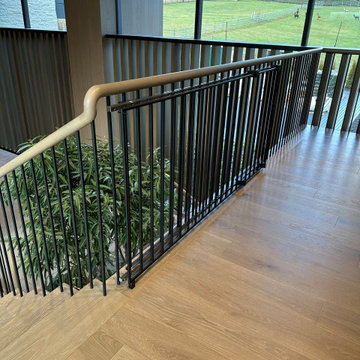Architectural Digest Featured Floating Staircase & Custom Millwork