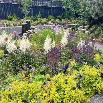 Dynamic perennial flower cutting garden with basalt sculptural fountain