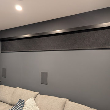 Motorized Blackout Roller Shade under Black Metal Fascia