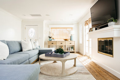 Example of a beach style living room design in Orange County