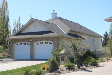 Example of an exterior home design in Edmonton