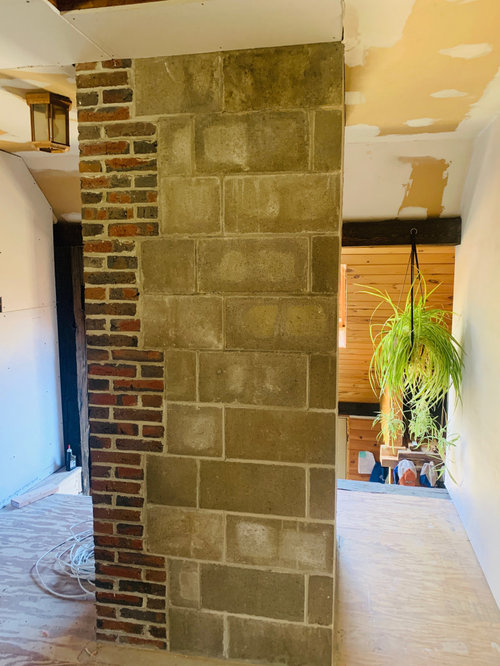 Home Renovation Fully exposed brick chimney finished in cinder blocks