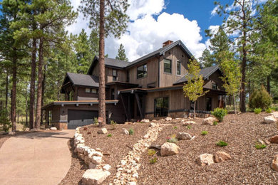 Example of a mountain style exterior home design in Phoenix