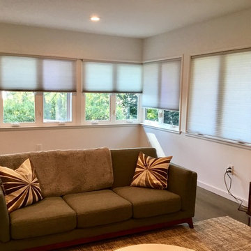 ...After photo of light filtering honeycomb shades in grey