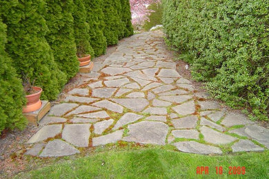 This is an example of a side yard stone landscaping in Seattle.