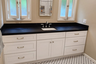 Bathroom - mid-sized transitional master black and white tile and porcelain tile single-sink bathroom idea in San Diego with shaker cabinets, white cabinets, an undermount sink, quartz countertops, black countertops and a built-in vanity