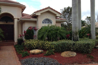 Inspiration for a stucco exterior home remodel in Miami