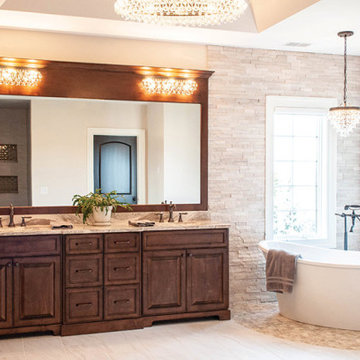 Luxury Stone-Wrapped Spa Bath with Rich Wood Vanity
